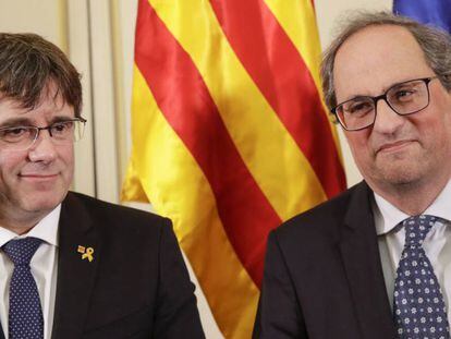 Carles Puigdemont y Quim Torra durante una rueda de prensa este lunes en Bruselas.