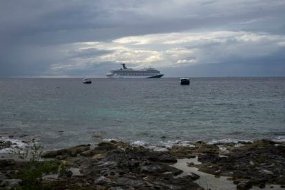 A cruise ship crosses the waters of Cozumel in front of the area where the fourth pier is planned to be built.