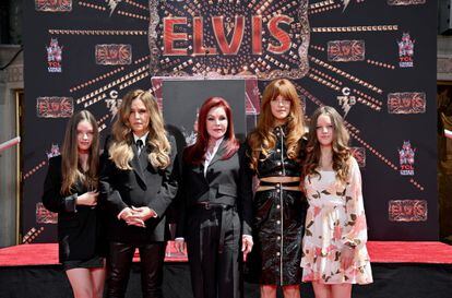 From left to right, Harper Vivienne Ann Lockwood, Lisa Marie Presley, Priscilla Presley, Riley Keough and Finley Aaron, at a ceremony honoring Elvis Presley on June 21, 2022.