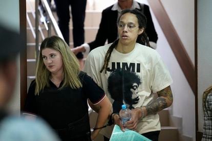 WNBA star Brittney Griner enters the courthouse where her criminal case began in Russia.