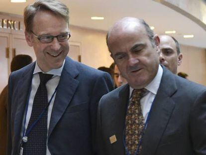 Jens Weidmann con Luis de Guindos