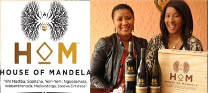 Dos miembros de la familia Mandela con el vino que lleva el nombre del patriarca
