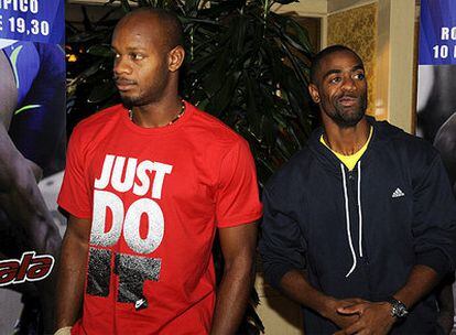 Asafa Powel (izquierda) y Tyson Gay en la presentación de la Golden Gala de Roma.