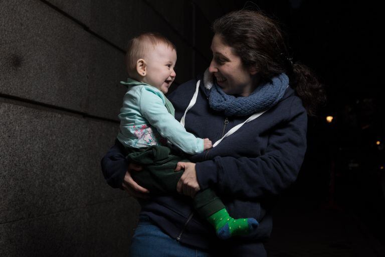 Marta Castanys poses with her daughter Yaiza in her arms, almost seven months after having overcome the coronavirus.
