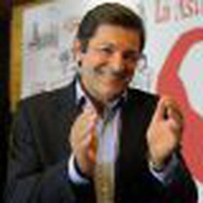 Fernandez smiles after the news conference where he announced his electoral victory, in Oviedo