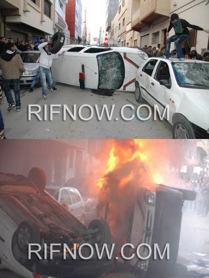 Vehículos de la policía marroquí, destrozados y quemados durante los disturbios del 20 de febrero.