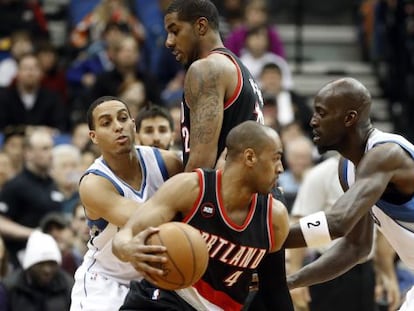 Garnett trata de frenar a Afflalo.