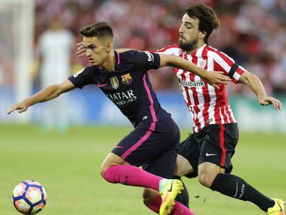 Denis Su&aacute;rez y Be&ntilde;at Etxebarria disputan un bal&oacute;n durante el partido de la segunda jornada entre el Athletic y el FC Barcelona.  