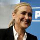 Cifuentes, Madrid's regional candidate of ruling People's Party (PP), smiles inside PP headquarters after the regional and municipal elections in Madrid
