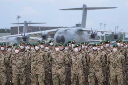 The last German troops withdrawn from Afghanistan form in front of an A400M plane upon arrival at the Wunstorf base in Lower Saxony on Wednesday.