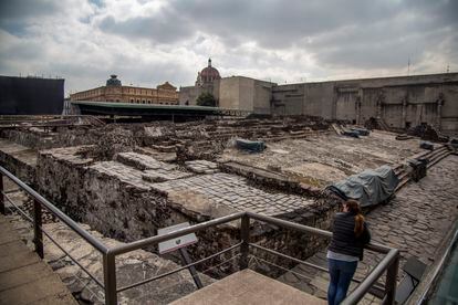 A woman visits the ruins of the Templo Mayor in Mexico City in 2019.