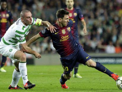 Messi trata de sortear a Brown en el partido de la Liga de Campeones contra el Celtic del pasado martes
