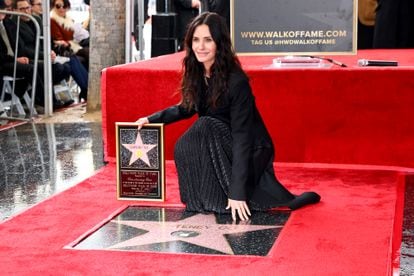 Courteney Cox with her star on the Hollywood Walk of Fame.