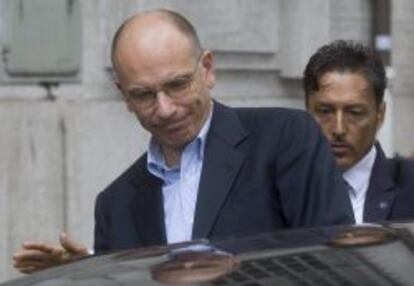 El primer ministro italiano, Enrico Letta, tras la renuncia delos ministros del partido de Berlusconi.