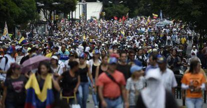 Opositores venezolanos participan en una marcha contra Maduro en julio.