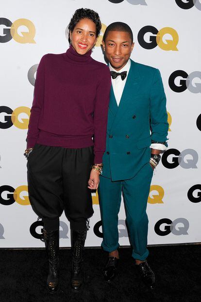 Aunque cuando se pone su famoso sombrero, Pharrell Williams parece más alto, nunca conseguirá alcanzar a su mujer, la modelo Helen Lasichanh.