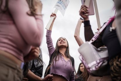 Protesters shout harangues outside the headquarters of the Attorney General's Office, where they also gathered to demand the election of a female prosecutor.