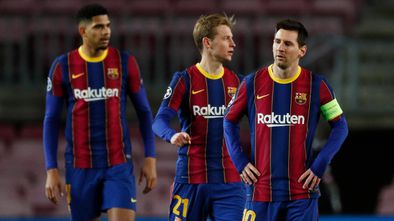 Soccer Football - Champions League - Group G - FC Barcelona v Juventus - Camp Nou, Barcelona, Spain - December 8, 2020 FC Barcelona's Lionel Messi and teammates look dejected after Juventus' Cristiano Ronaldo scored their third goal REUTERS/Albert Gea