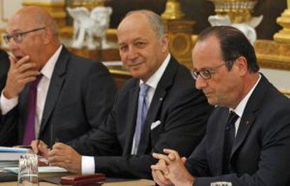 Hollande, junto al ministro Fabius, el pasado viernes.