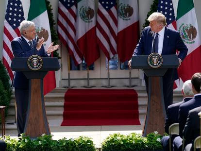 President Donald Trump listens as Mexican President Andres Manuel Lopez Obrador claps during an event in the Rose Garden at the White House, Wednesday, July 8, 2020, in Washington. (AP Photo/Evan Vucci)