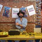 Miguel Ángel Vázquez, miembro del colectivo La Imprenta, posa dentro del nuevo centro cultural/librería La Imprenta en el barrio de Malasaña en Madrid.
