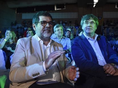 Jordi Sànchez y Carles Puigdemont, en el congreso Argeles-sur-Mer en junio.