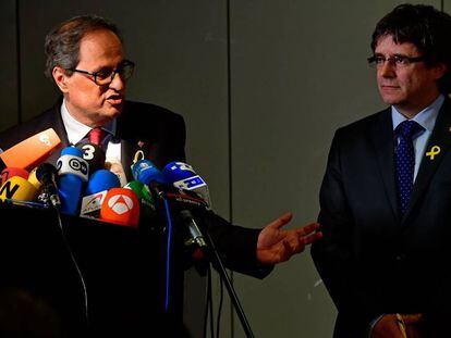 Quim Torra y Carles Puigdemont, durante la rueda de prensa en Berlín.