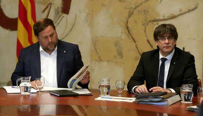 El presidente de la Generalitat, Carles Puigdemont, y el vicepresidente, Oriol Junqueras.