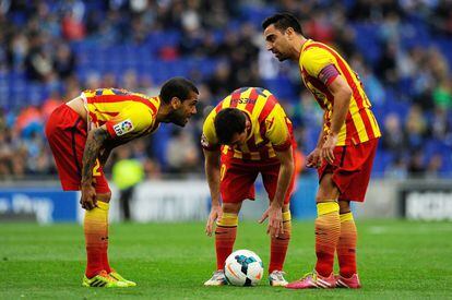 Alves, Messi y Xavi