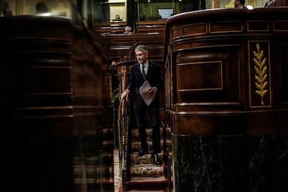 Grande-Marlaska abandona la tribuna tras su intervención.