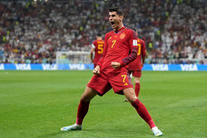 Spain's Alvaro Morata celebrates after scoring the opening goal during the World Cup group E soccer match between Spain and Germany, at the Al Bayt Stadium in Al Khor , Qatar, Sunday, Nov. 27, 2022. (AP Photo/Matthias Schrader)