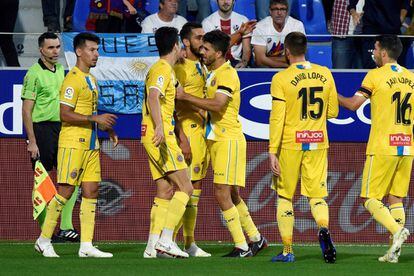 Los jugadores del Espanyol celebran uno de los goles de Borja Iglesias ante el Huesca.