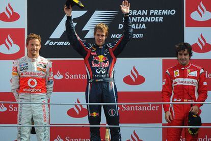 Vettel, junto a Button y Alonso en el podio