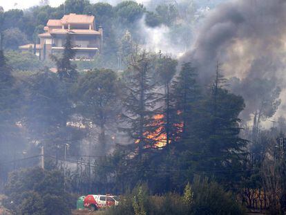 Vista del incendio forestal ocurrido este verano entre las localidades de Robledo de Chavela y Valdemaqueda , a unos sesenta kilómetros al oeste de la ciudad de Madrid.