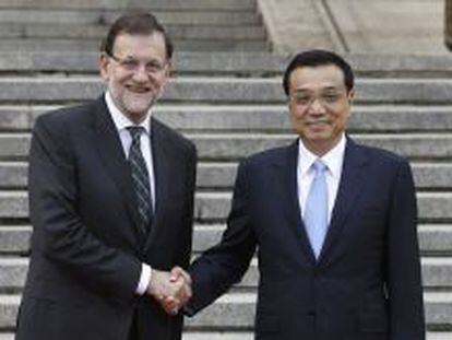 El pesidente del Ejecutivo espa&ntilde;ol, Mariano Rajoy, junto al primer ministro chino Li Keqiang, el pasado mes de septiembre, en Pek&iacute;n.