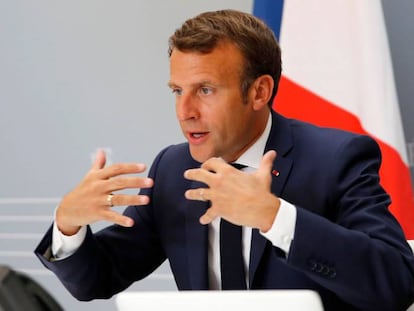 El presidente francés, Emmanuel Macron en un encuentro con el director general de la OMS