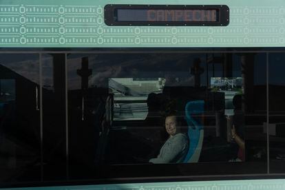 A passenger aboard the Mayan Train at the Cancún station.