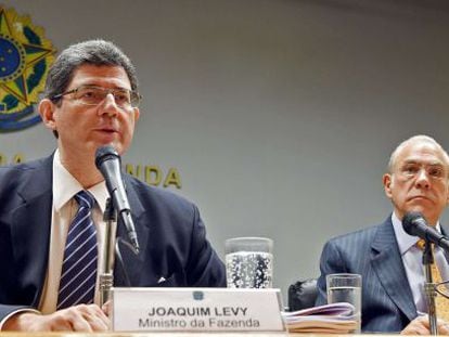 Joaquim Levy y &Aacute;ngel Gurr&iacute;a, en Brasilia. 