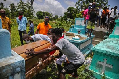 Burial of a victim of the earthquake in Haiti.

