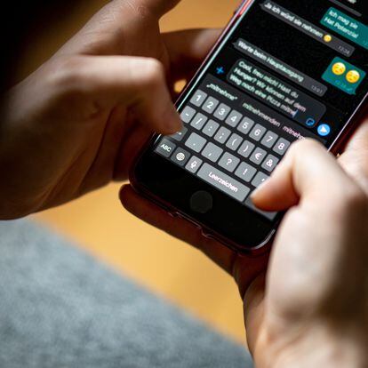 24 April 2021, Berlin: A woman writes a message in the app Whatsapp. Photo: Fabian Sommer/dpa (Photo by Fabian Sommer/picture alliance via Getty Images)