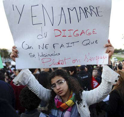 “Estamos hartos del fuera de aquí”, reza un cartel en una protesta de 2011 en Túnez.