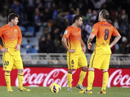 Messi, Xavi e Iniesta, cariacontecidos en Anoeta
