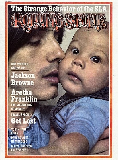 Cover of 'Rolling Stone' from May 1974 where he poses with his son Ethan. The photo is by Annie Leibovitz.