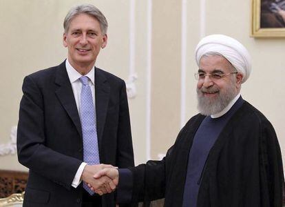 Rohani, con el ministro de Exteriores brit&aacute;nico el 24 de agosto.