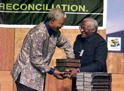 Archbishop Desmond Tutu with then-South African President Nelson Mandela in 1998.