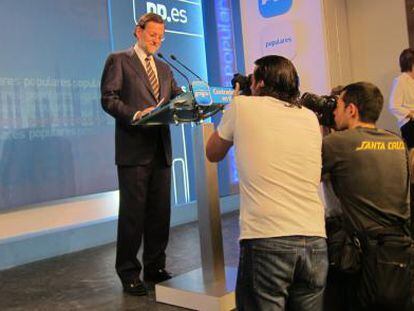 El presidente del PP, Mariano Rajoy, durante la rueda de prensa en Génova.