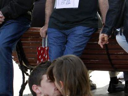 Un indignado portaba un cartel alusivo a Rita Barberá, alcaldesa de Valencia.