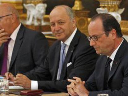 Hollande, junto al ministro Fabius, el pasado viernes.