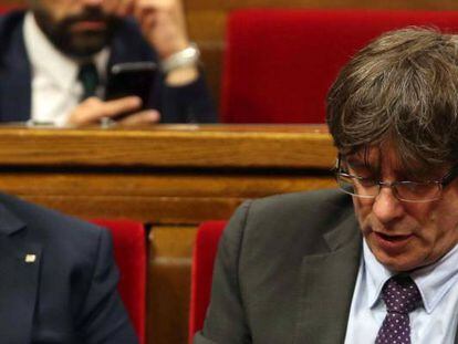 El presidente de la Generalitat, Carles Puigdemont y el vicepresidente del Govern, Oriol Junqueras.