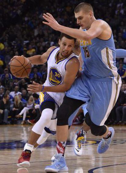 Curry ante Jokic en un Warriors-Nuggets.
